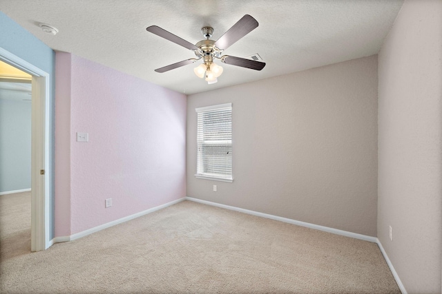 19842 Haven Cliff Ln, Cypress, TX 77433 - unfurnished bedroom featuring carpet flooring, a ceiling fan, and a textured ceiling