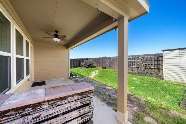 19842 Haven Cliff Ln, Cypress, TX 77433 - fenced backyard featuring ceiling fan and a patio