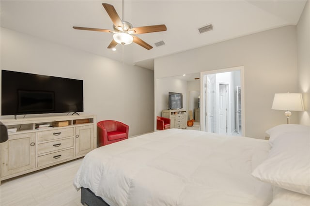 6510 Preston Trail Dr, Houston, TX 77069 - bedroom featuring lofted ceiling, a ceiling fan, and light wood-style floors