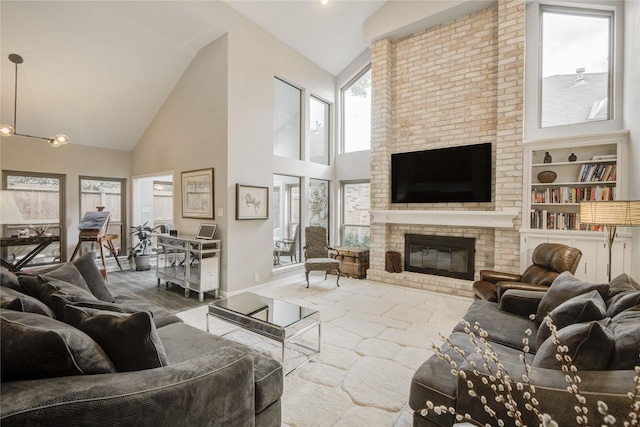 6510 Preston Trail Dr, Houston, TX 77069 - living area featuring high vaulted ceiling, a fireplace, and stone finish flooring