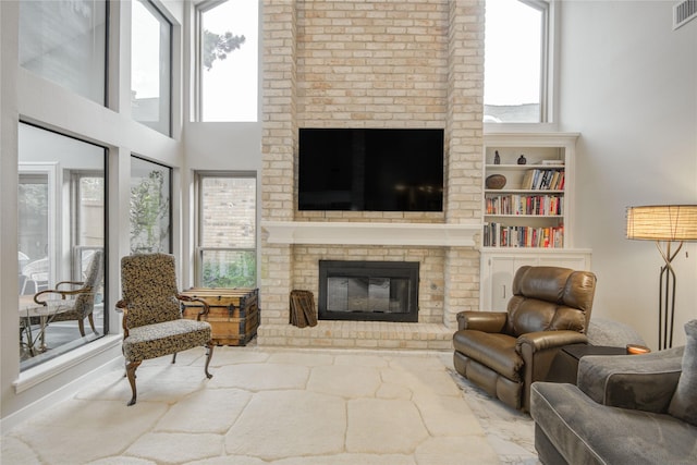 6510 Preston Trail Dr, Houston, TX 77069 - living area featuring a brick fireplace and a high ceiling