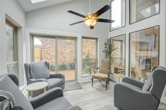 6510 Preston Trail Dr, Houston, TX 77069 - sunroom / solarium with wood finished floors, a towering ceiling, and a skylight
