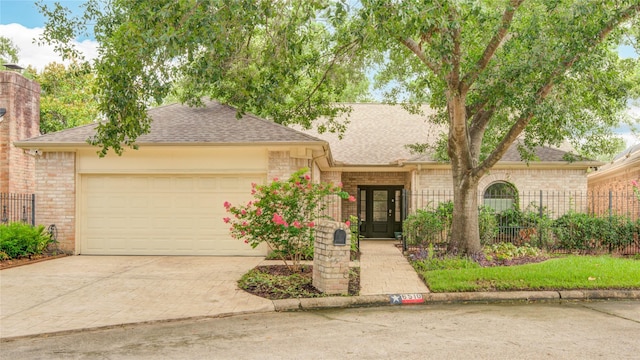 6510 Preston Trail Dr, Houston, TX 77069 - ranch-style home featuring a shingled roof and brick siding