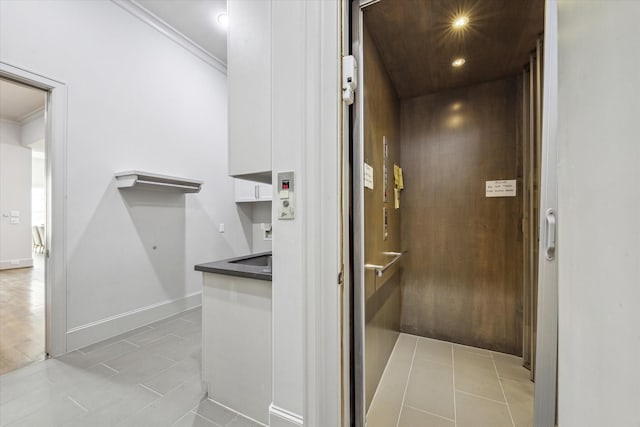 4615 Verone St, Bellaire, TX 77401 - elevator featuring ornamental molding and recessed lighting