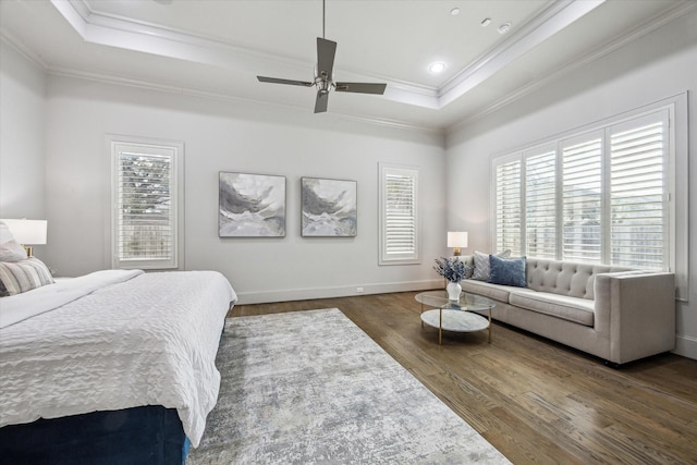 4615 Verone St, Bellaire, TX 77401 - bedroom featuring a raised ceiling, crown molding, multiple windows, wood finished floors, and ceiling fan