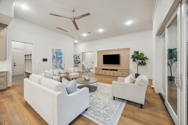 4615 Verone St, Bellaire, TX 77401 - living room featuring crown molding, ceiling fan, wood finished floors, and recessed lighting