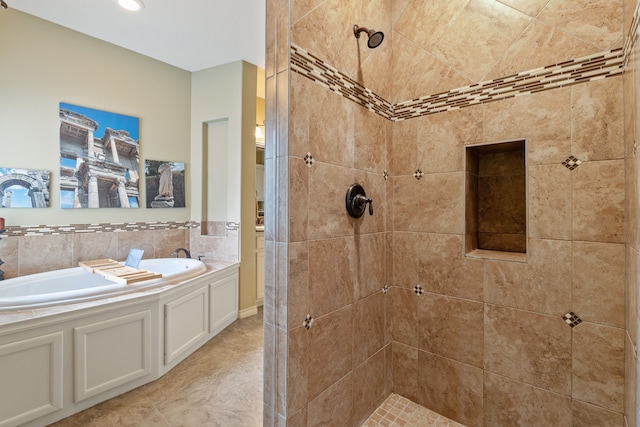 111 Bessie Price Owen Dr, Montgomery, TX 77356 - bathroom with a garden tub and a tile shower
