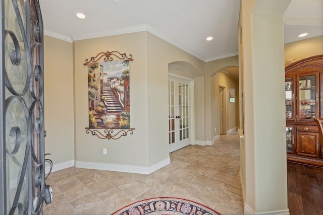 111 Bessie Price Owen Dr, Montgomery, TX 77356 - foyer entrance featuring arched walkways, french doors, crown molding, and recessed lighting