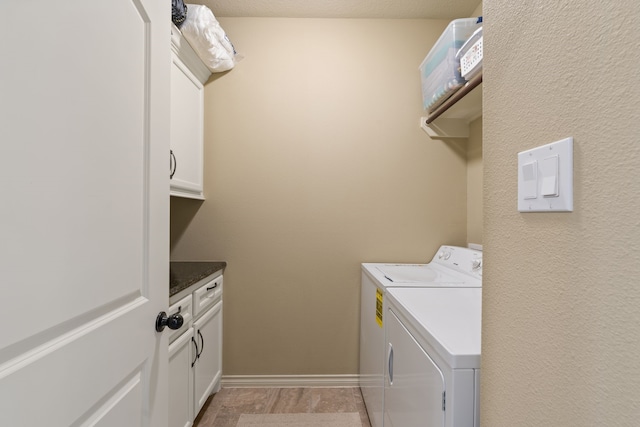 111 Bessie Price Owen Dr, Montgomery, TX 77356 - laundry room with independent washer and dryer and cabinet space