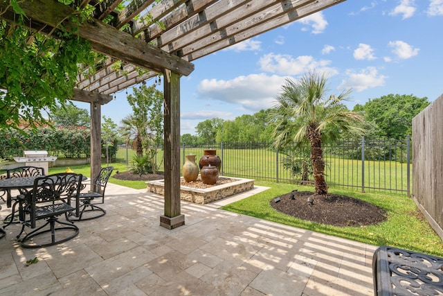 111 Bessie Price Owen Dr, Montgomery, TX 77356 - fenced backyard featuring a pergola, outdoor dining area, a patio, and a grill