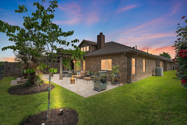 111 Bessie Price Owen Dr, Montgomery, TX 77356 - rear view of house featuring a chimney, brick siding, a patio, and roof with shingles
