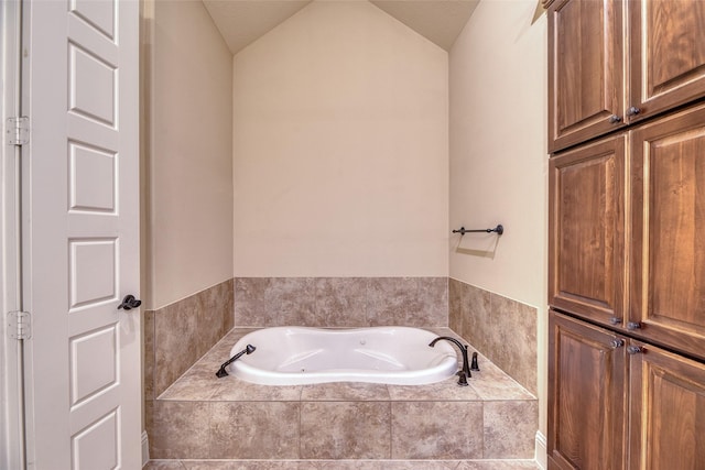 107 Lake View Loop, Fulshear, TX 77441 - bathroom with a garden tub and lofted ceiling