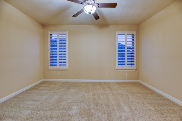 107 Lake View Loop, Fulshear, TX 77441 - carpeted empty room featuring baseboards and a ceiling fan