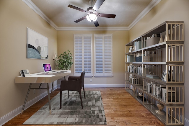107 Lake View Loop, Fulshear, TX 77441 - home office with wood finished floors, ceiling fan, and crown molding