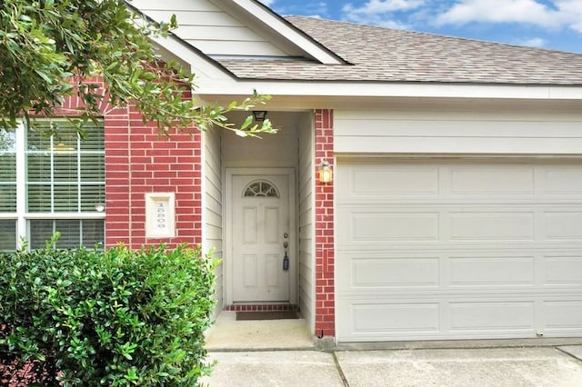 15806 Marble Bluff Ln, Houston, TX 77049 - entrance to property featuring roof with shingles and brick siding