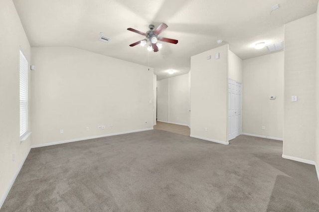 15806 Marble Bluff Ln, Houston, TX 77049 - spare room featuring ceiling fan, carpet flooring, and vaulted ceiling