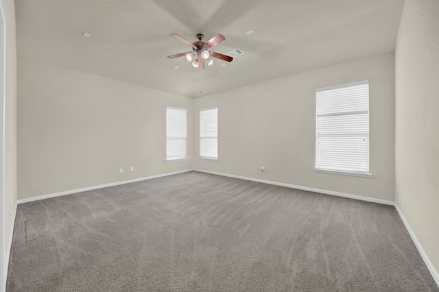 15806 Marble Bluff Ln, Houston, TX 77049 - spare room featuring ceiling fan, carpet floors, and plenty of natural light
