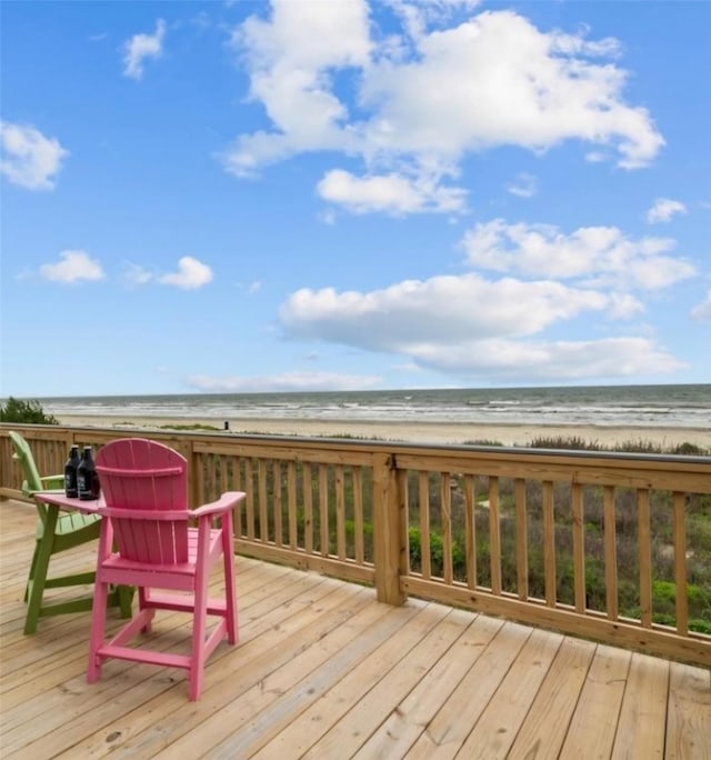 21446 Gulf Dr, Galveston, TX 77554 - wooden terrace with view of water and beach