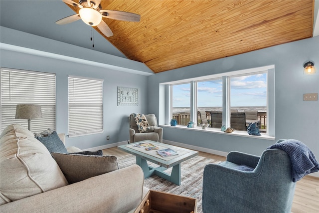 21446 Gulf Dr, Galveston, TX 77554 - living room with lofted ceiling, wood finished floors, a ceiling fan, and wood ceiling