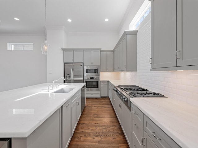 1110 W 12th St, Houston, TX 77008 - kitchen featuring stainless steel appliances, gray cabinetry, ornamental molding, decorative backsplash, and dark wood-style floors