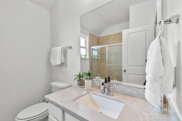 2824 Jehlon Ln, Conroe, TX 77385 - full bathroom featuring vanity, lofted ceiling, and a stall shower