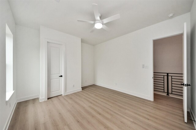 435 Neyland St, Houston, TX 77022 - unfurnished bedroom featuring light wood-style flooring and a ceiling fan