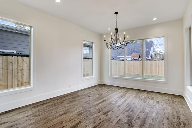 1514 Chantilly Ln, Houston, TX 77018 - unfurnished dining area featuring a chandelier, wood finished floors, and recessed lighting