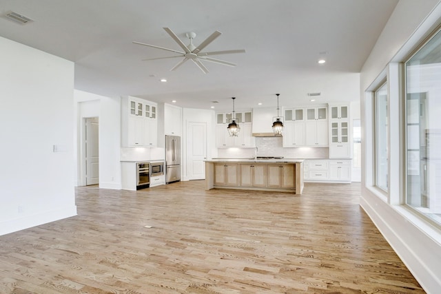 1514 Chantilly Ln, Houston, TX 77018 - kitchen with appliances with stainless steel finishes, ceiling fan, backsplash, light wood-type flooring, and recessed lighting