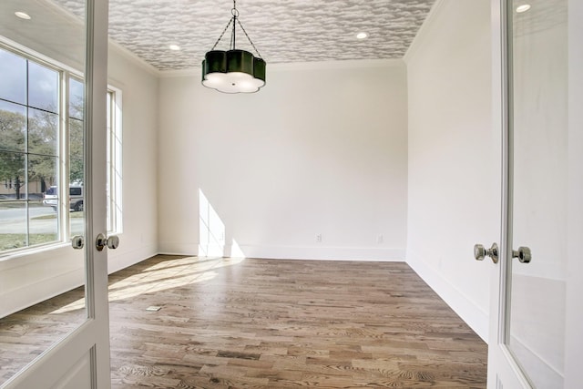 1514 Chantilly Ln, Houston, TX 77018 - unfurnished room with french doors, crown molding, wood finished floors, and recessed lighting