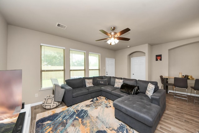 7947 Cinderella St, Houston, TX 77028 - living room with wood finished floors and ceiling fan