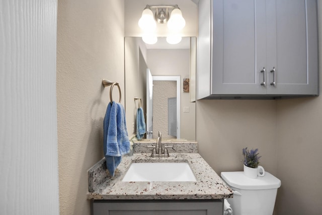 7947 Cinderella St, Houston, TX 77028 - bathroom featuring vanity and a textured wall