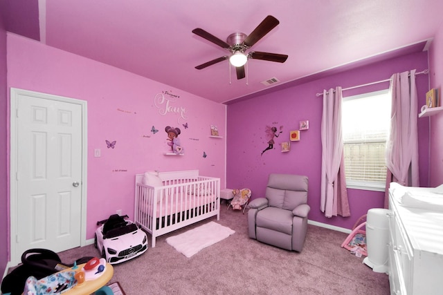 7947 Cinderella St, Houston, TX 77028 - bedroom featuring a crib, carpet flooring, and ceiling fan