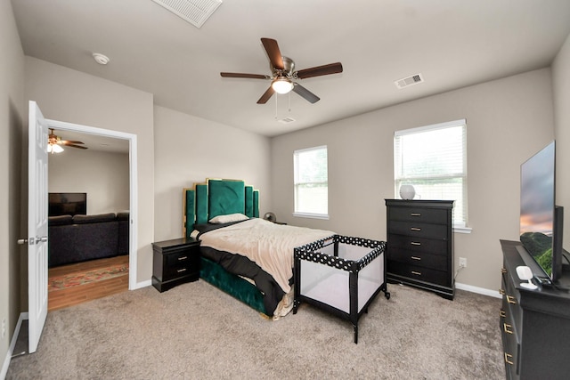7947 Cinderella St, Houston, TX 77028 - bedroom with light carpet and a ceiling fan