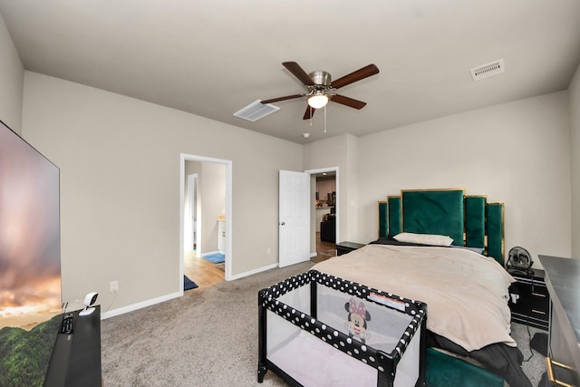 7947 Cinderella St, Houston, TX 77028 - carpeted bedroom featuring baseboards and a ceiling fan