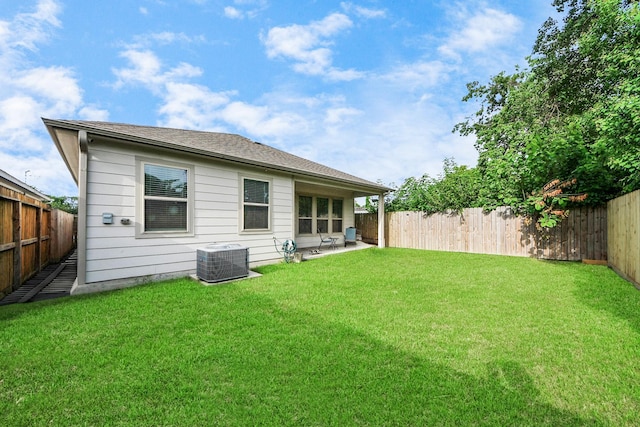 7947 Cinderella St, Houston, TX 77028 - back of property featuring a fenced backyard and a patio