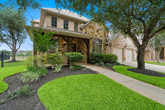 18331 Chapmans Count Rd, Cypress, TX 77433 - traditional-style home with stone siding and driveway
