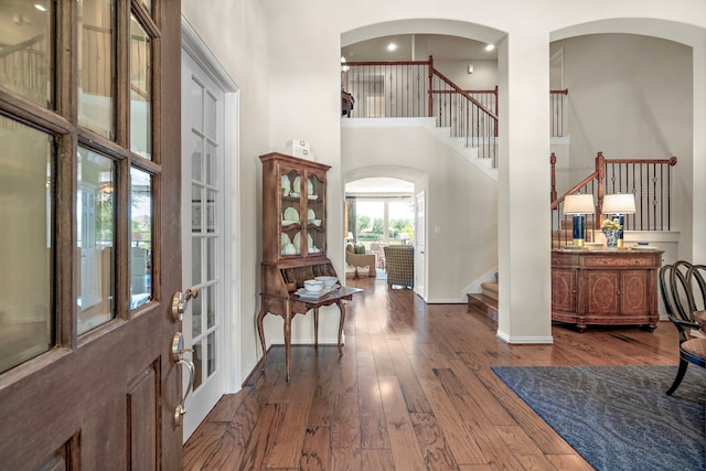18331 Chapmans Count Rd, Cypress, TX 77433 - foyer with stairs, dark wood finished floors, and a high ceiling