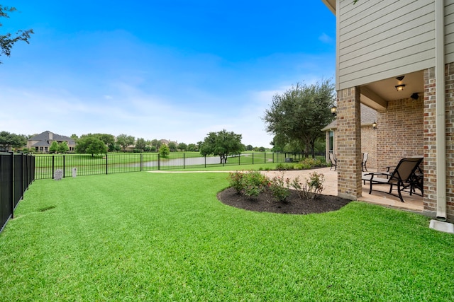 18331 Chapmans Count Rd, Cypress, TX 77433 - fenced backyard with a patio area and a water view
