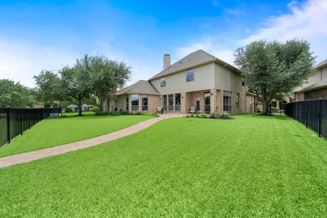 18331 Chapmans Count Rd, Cypress, TX 77433 - back of property with brick siding and a chimney