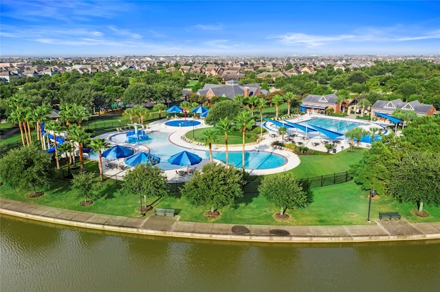 18331 Chapmans Count Rd, Cypress, TX 77433 - bird's eye view of a pool area and a nearby body of water