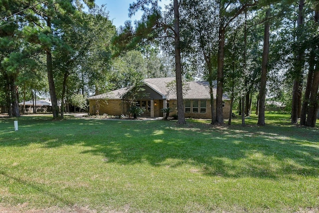 18110 Auburn Dr, Tomball, TX 77375 - view of front of house featuring a front lawn