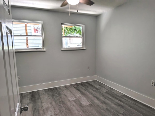 1805 39th St, Galveston, TX 77550 - unfurnished room with ceiling fan and dark wood-style flooring
