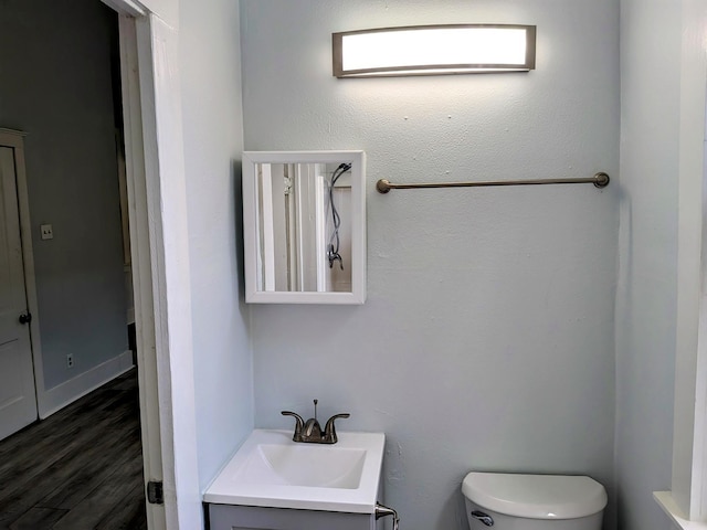 1805 39th St, Galveston, TX 77550 - bathroom featuring vanity and wood finished floors