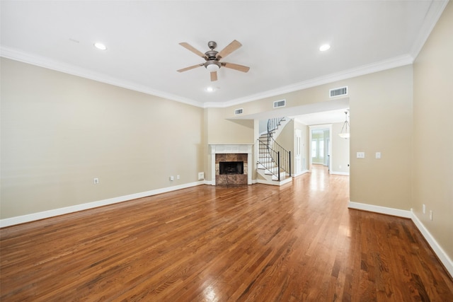 606 E 27th St, Houston, TX 77008 - unfurnished living room featuring ceiling fan, wood finished floors, recessed lighting, crown molding, and a premium fireplace
