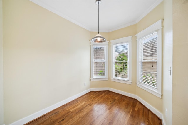 606 E 27th St, Houston, TX 77008 - unfurnished dining area with wood finished floors and ornamental molding