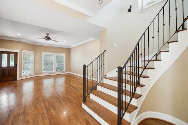 606 E 27th St, Houston, TX 77008 - foyer featuring a ceiling fan, wood finished floors, ornamental molding, stairway, and recessed lighting