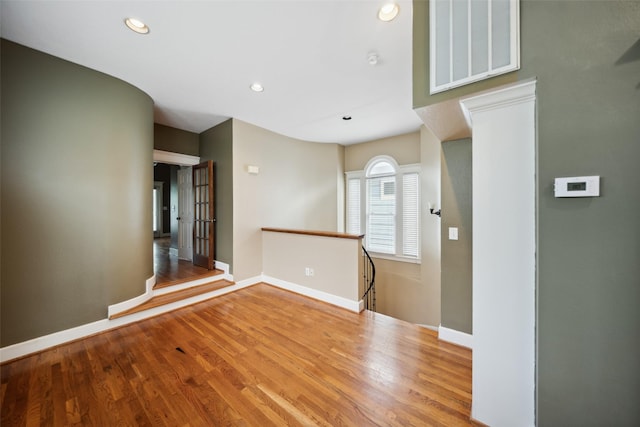 606 E 27th St, Houston, TX 77008 - spare room with wood finished floors and recessed lighting