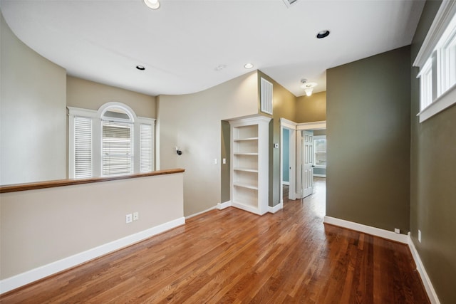 606 E 27th St, Houston, TX 77008 - spare room with wood finished floors and recessed lighting