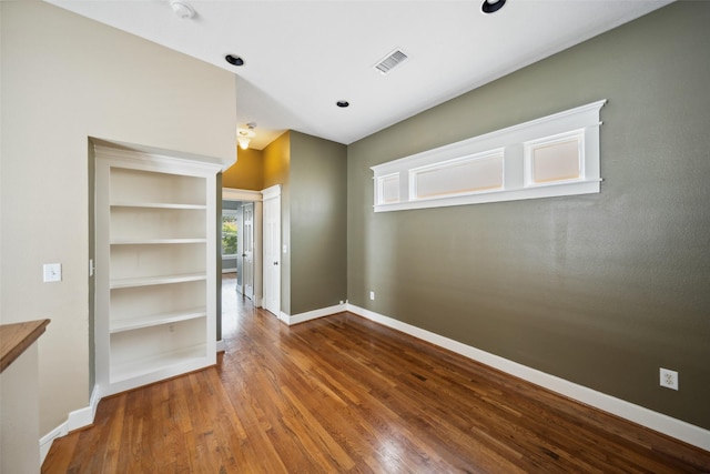 606 E 27th St, Houston, TX 77008 - empty room featuring wood finished floors and a smoke detector