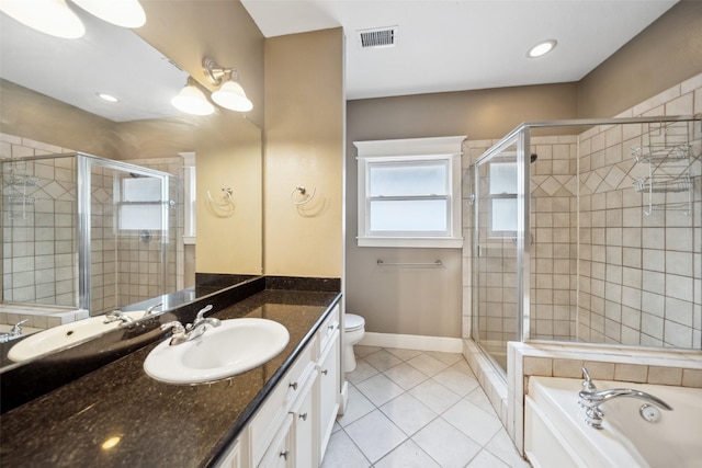 606 E 27th St, Houston, TX 77008 - bathroom featuring tile patterned floors, vanity, and a stall shower